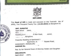 I am OCI living in USA. My mother own a property in Bangalore. How can I transfer the property to my name?